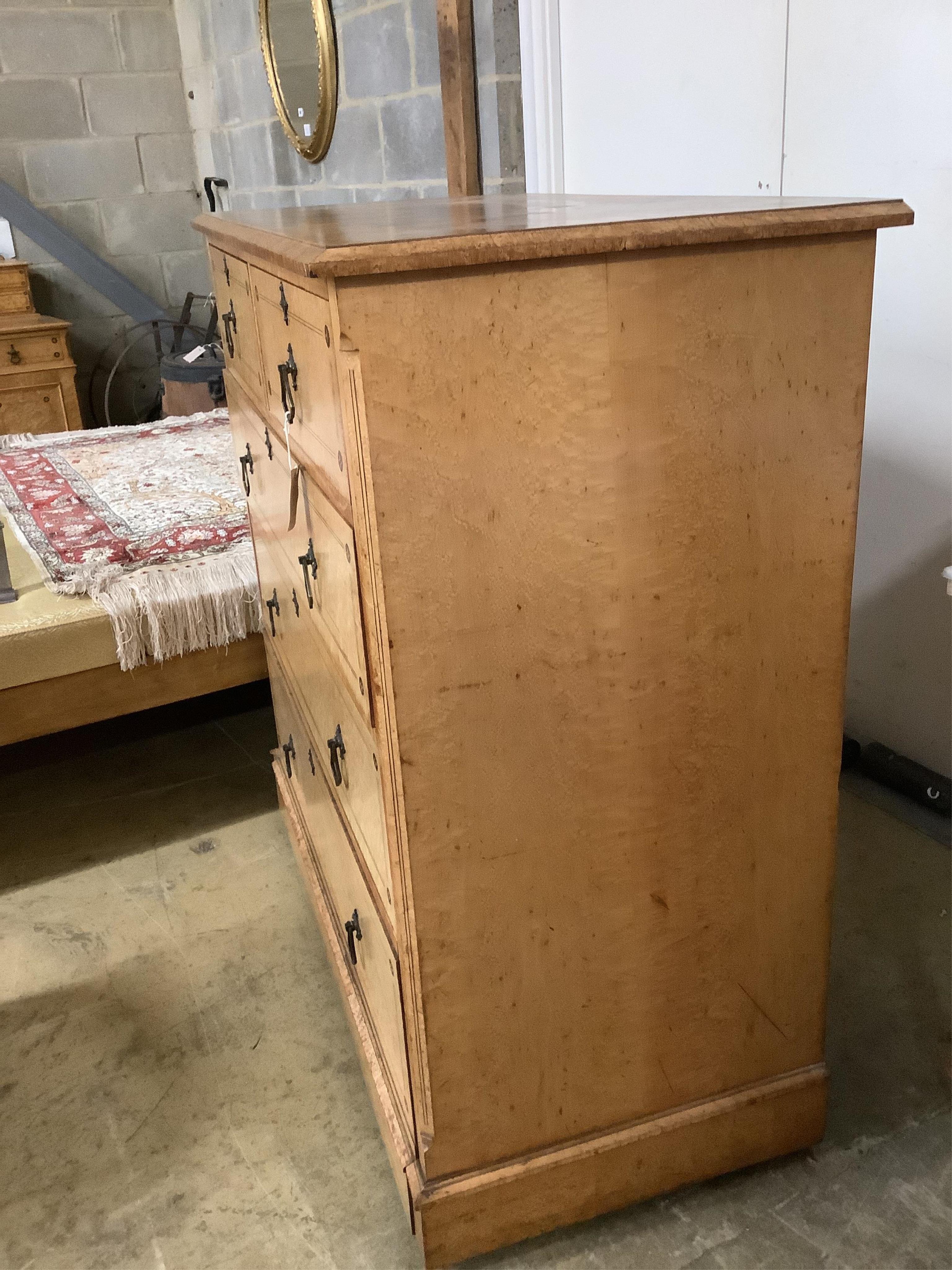 A late Victorian Gothic revival ebony inlaid, bird's eye maple bedroom suite, manner of Charles Bevan, comprising 5ft bed frame, kneehole dressing table, chest of drawers, marble top washstand, bedside cabinet, commode a